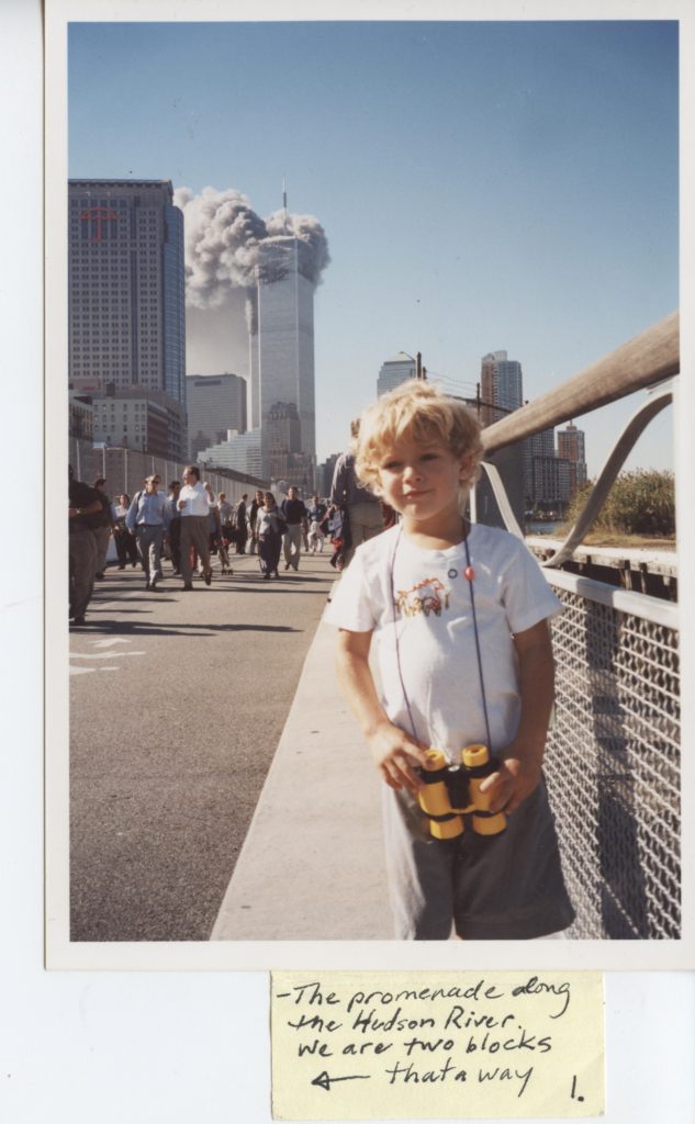 A young child holding a pair of yellow binoculars. Behind him, the World Trade Center is smoking and people are walking away from it. A caption says "The promenade along the Hudson River. We are two blocks (an arrow pointing left) thataway."
