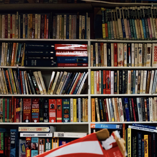 Book shelf stuffed with reference books